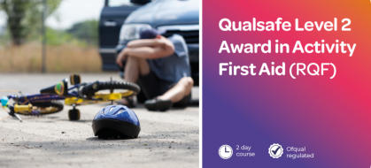 Forestry professional holding chainsaw after cutting down tree